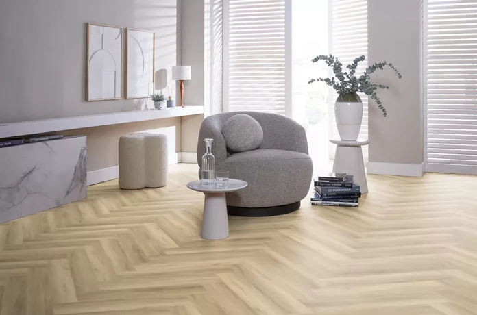 Voorbeeld van een beige visgraat pvc vloer